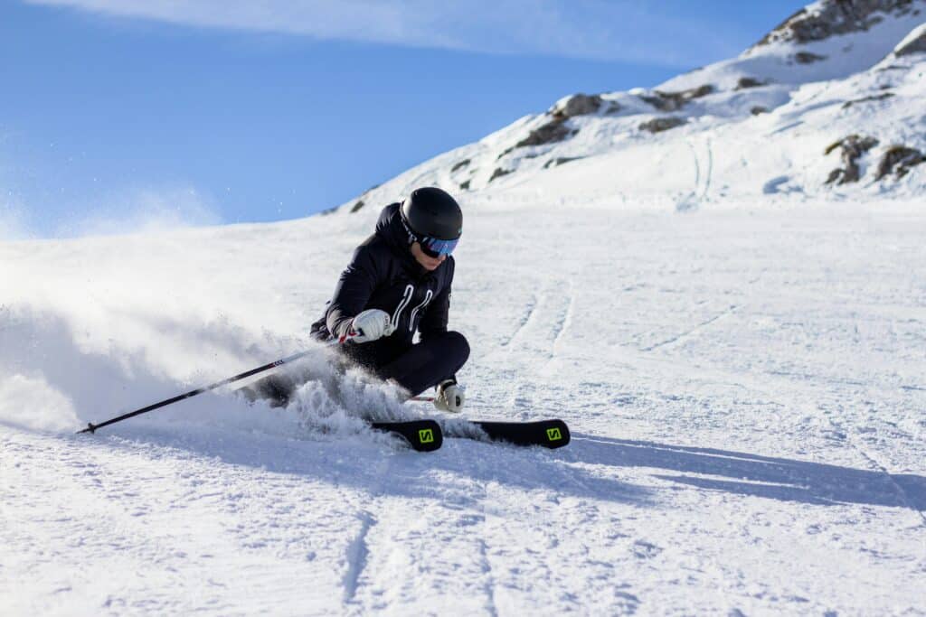 Person Skiing in Mountains 